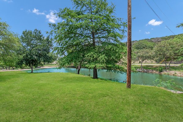 Pond and grounds on the 230-acre ranch