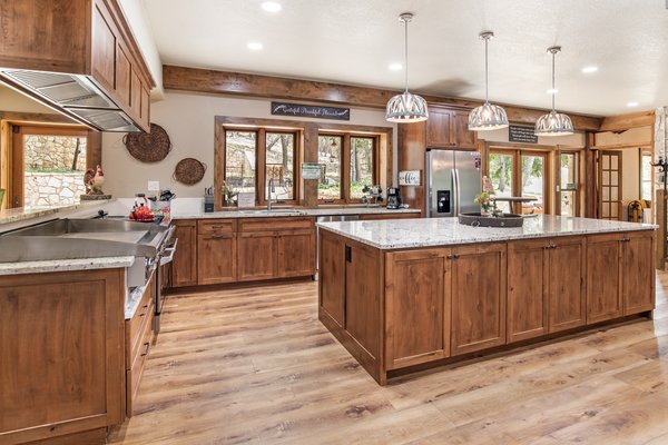Rustic open kitchen with granite island